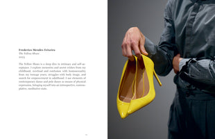 A two-page book spread. The left page has text describing the work The Yellow Shoes by Frederico Mendes Teixeira. The right page shows a photograph of a person in a grey shirt holding a pair of glossy, bright yellow pointed-toe stiletto heels against a grey background.
