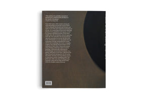 An angled, studio shot of the back of a dark brown book against a white background. The left side features white text describing the artist Frans Hals, with a barcode and publisher details at the bottom. The right side shows a dark, abstract detail from a painting.