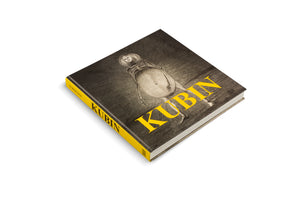 A square, hardcover art book titled KUBIN, presented at an angle on a white background. The dark cover features a macabre illustration of a figure with a skeletal ribcage and a large, fleshy belly. The title is in large, bold, yellow letters. The spine is also bright yellow.