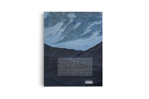 The back cover of a book, shown at an angle against a white background. The cover features a romantic-style painting of a dark, jagged mountain range under a cloudy blue sky. A block of text in German is printed over the lower right portion of the image, with a barcode and ISBN at the very bottom.