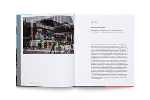 An open book viewed from above. The left page features a composite photograph that blends a historical, black and white image of Berlin's Bahnhof Zoo with a modern, full-color image of the same location, showing people from both eras. The right page contains German text with the headline Bilder über Bilder.