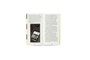 An open book showing pages 94 and 95 against a white background. The left page contains text and a black-and-white photograph of a smartphone with a shattered screen, while the right page is filled with text.