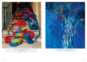 A two-page book spread displays two distinct artworks side-by-side. On the left, a photograph shows long, wide, colorful ribbons of red, blue, and green linen wrapped around cork, coiled and cascading down a rustic stone staircase. On the right, a vibrant abstract oil painting features energetic, vertical brushstrokes in deep blues, purples, and yellows, suggesting reeds or tall grass reflected in water.