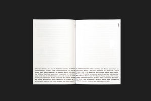 An open book lies flat on a dark surface, displaying a two-page spread with text. The bottom half of the pages features a printed biography of DeForrest Brown, Jr., describing him as a writer, rhythmanalyst, and musician known as Speaker Music. The text mentions his work with the Make Techno Black Again campaign and his book, Assembling a Black Counter Culture. The page numbers EN041 and EN042 are printed vertically in the center margin.