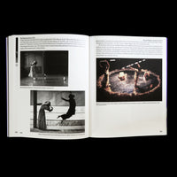 An open book displays a two-page spread, pages 306 and 307, featuring text and black-and-white photographs. The left page discusses The Plateau Series, with two photos of women dancing. The right page discusses the opera Recent Ruins, with one photo of performers on a circular, stone-lined stage set.