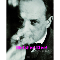 A black and white photograph of the artist Paul Klee smoking a cigar on the cover of the book Meister Klee! Lehrer am Bauhaus.