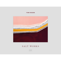 The book cover for Salt Works by Tom Hegen, featuring an abstract aerial photograph of salt flats with horizontal bands of pink, white, yellow, and deep red.