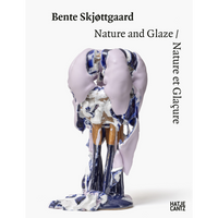 The cover of the book Bente Skjøttgaard: Nature and Glaze, featuring a tall, abstract ceramic sculpture with a complex glaze of lavender, dark blue, white, and tan.