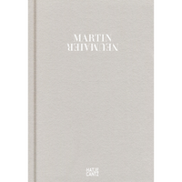 The pale, textured cover of the book Martin Neumaier, where the last name is flipped vertically.