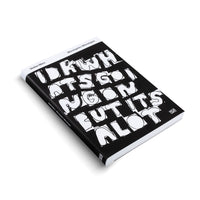 A black book by Stefan Marx titled Monotypes, shown at an angle on a white background. The cover features large, hand-drawn white block text that reads, IDK WHATS GOING ON BUT ITS A LOT.