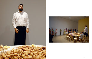 A diptych showing an art performance. The left panel is a close-up of a man in a white shirt standing behind a large, round table piled high with potatoes. The right panel is a wide shot of the same scene in a gallery, showing the man addressing an audience seated at and standing around the potato-covered table.