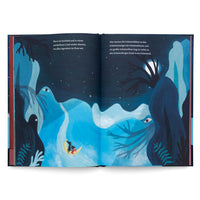 An open picture book with a two-page illustration of a fantastical night scene in shades of blue. A small figure in a black coat and red boots rides on a yellow crescent moon down a winding river. The surrounding dark blue hills and trees are shaped like creatures with eyes, watching the figure under a starry sky with a full moon. German text is printed above the illustration.