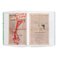 An open book viewed from above, displaying two pages of a vintage French publication. The left page, titled Feuille Rouge, has a bold red graphic of a gallows and hands breaking chains overlaid on columns of text. The right page, titled La torche entre les dents, is primarily text with a small black-and-white illustration. Both pages are yellowed with age.
