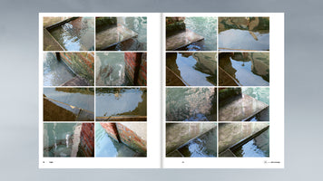 An overhead view of a two-page magazine spread laid open on a gray surface. The pages feature a grid of twenty close-up photographs showing water lapping against submerged concrete steps and mossy brick walls of a canal. The images focus on the patterns of light, ripples, and distorted reflections on the water.