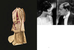 A page layout with two images. On the left, an ornate, multi-layered historical garment in cream, gold, and burgundy with intricate embroidery and pearl beading is displayed on a form against a black background. On the right, a black-and-white photo shows a woman with a dark 1920s bob and pearls gazing at a man in a formal tuxedo and white bow tie.