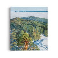 A vertical painting of a sunlit winter landscape viewed from above. In the foreground, a snowy slope with tracks descends into a dense green and gold pine forest covering a hill. In the distance, a vast, pale body of water stretches across the horizon under a light blue sky.