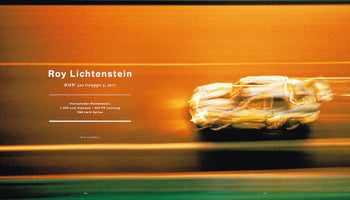 A motion-blurred photograph of the 1977 BMW 320 Group 5 Art Car designed by Roy Lichtenstein, captured at high speed on a racetrack. The car is a streak of light and color against a warm, orange-hued background. Text on the left identifies the artist and provides car specifications.