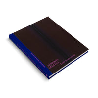 A hardcover book by Johannes Geccelli, titled Don't beam me up, is shown at an angle on a white background. The book has a dark, almost black cover with a subtle vertical line, a vibrant blue spine, and all text is printed in a bright magenta font.