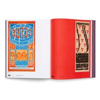An open book with a purple spine lays flat, displaying two pages against a white background. The left page features a colorful 1960s psychedelic concert poster for The Byrds at the Fillmore, with bright orange and blue text. The right page is mostly a solid, vibrant red, with a vertical, beige Art Nouveau-style poster with black and red details on the far right edge.
