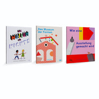 A product shot of three children's books in German, standing in a row against a white background. From left to right, the books are Das Museum für Nichts by Steven Guarnaccia, Das Museum der Formen by Sven Völker, and Wie eine Ausstellung gemacht wird. All three books feature colorful, artistic cover illustrations related to museums and art.